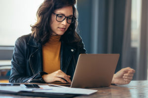 Salt Manage WordPress management woman on laptop