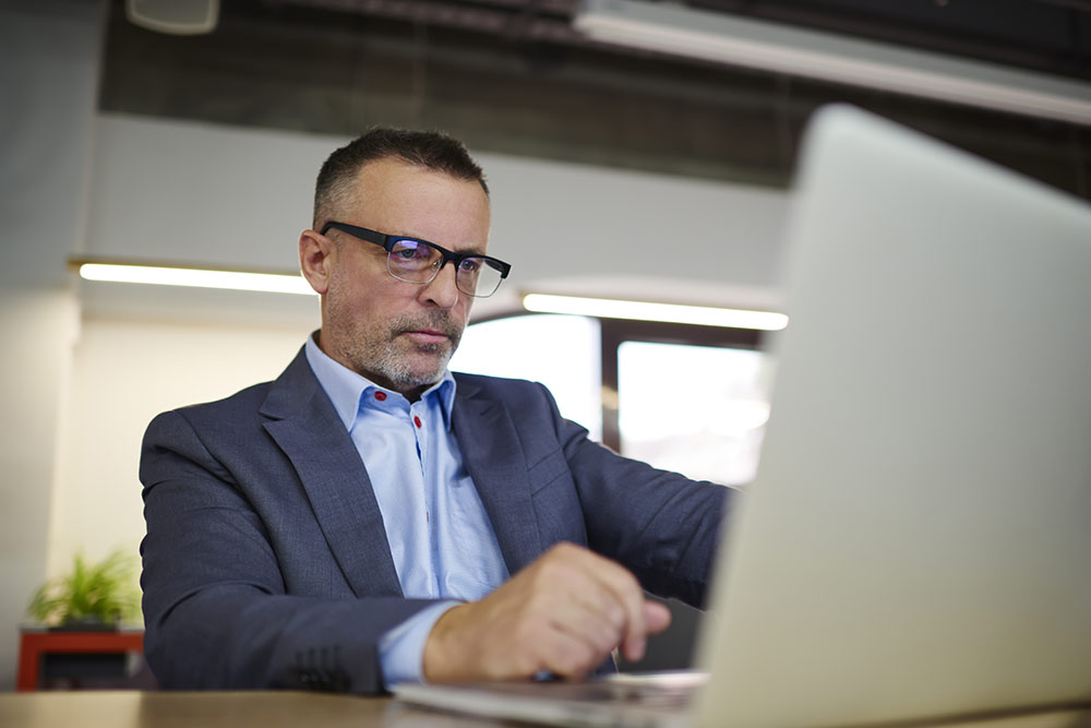 Business man working on laptop